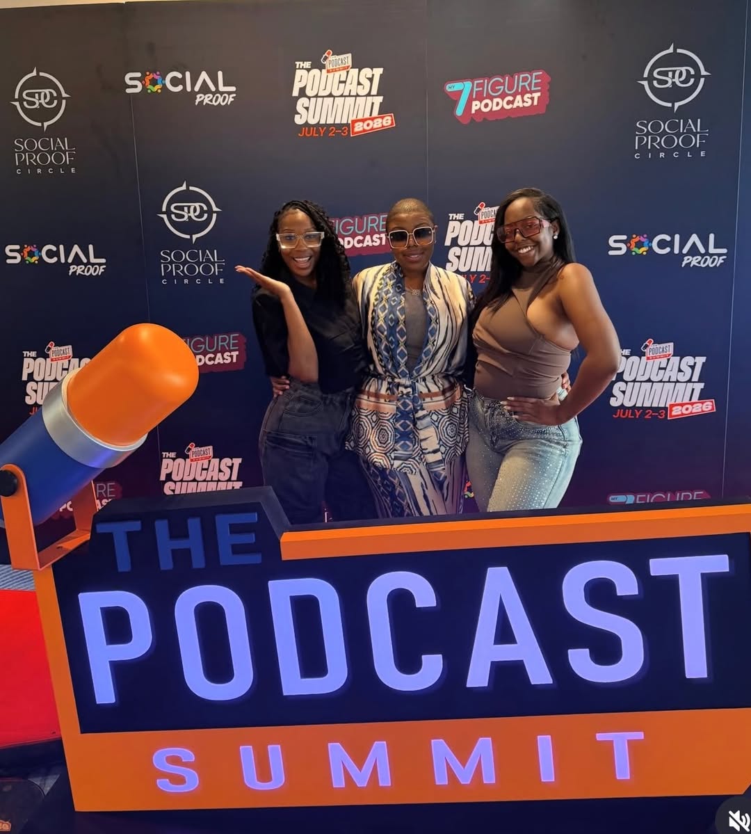 Attendees at the Podcast Summit 2026 photo wall